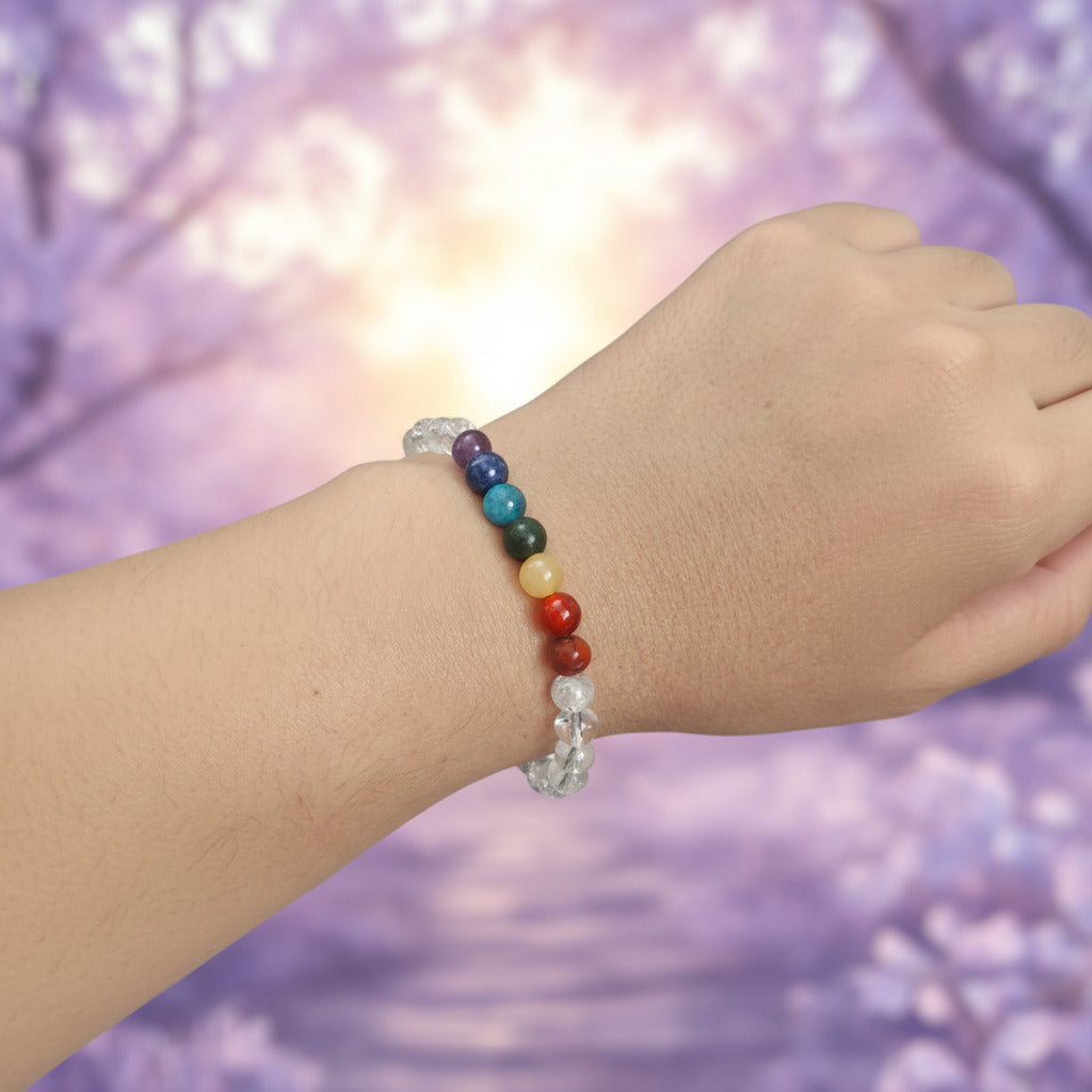 Pulsera "Equilibrio Universal" – Siete Chakras y Cuarzo Cristal Natural (6mm / 8mm)
