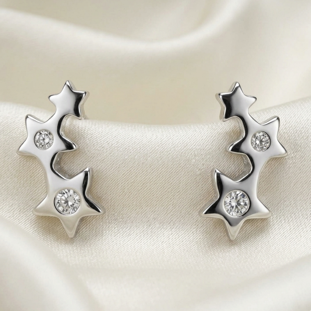 Pendientes "Constelación de Luz" – Estrellas en Plata de Ley con Circonitas (7x4 mm)