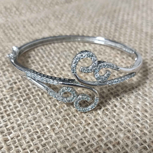 Pulsera Brazalete Rígido Rodiado con Rizos de Circonitas Engastadas en Plata de Ley 925
