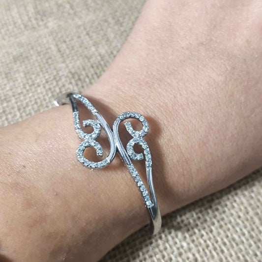 Pulsera Brazalete Rígido Rodiado con Rizos de Circonitas Engastadas en Plata de Ley 925
